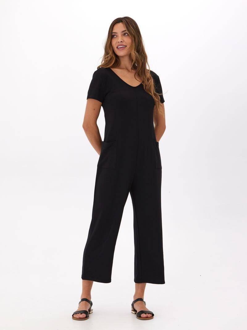 A comfortable and stylish short sleeve modal terry jumpsuit in a versatile fall design.
