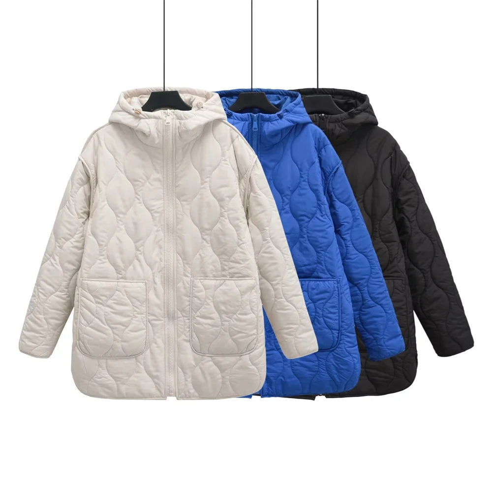 Three Harajuku style women's quilted hooded jackets in off-white, blue, and black, displayed on hangers against a white background.