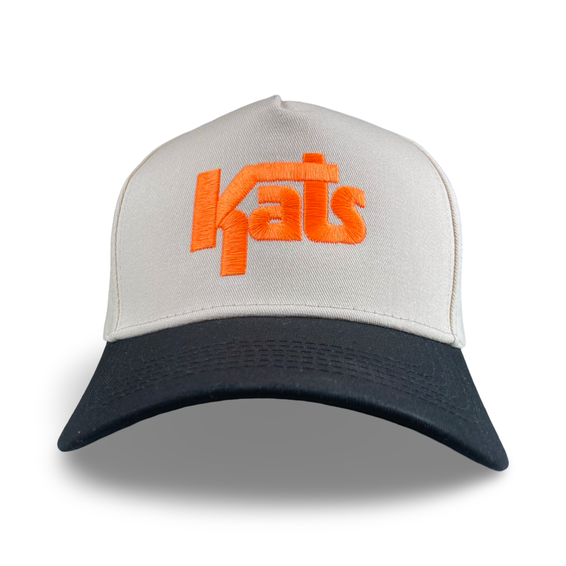 Bold Kats trucker hat with orange embroidery, white mesh crown, and navy bill.