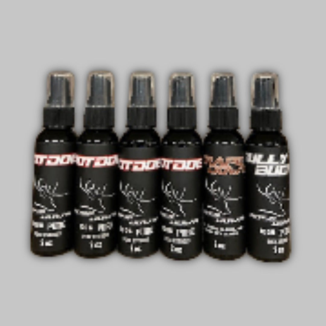 Set of 4 black spray bottles with red and white labels for rut hunting scent attractant.