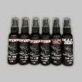 Set of 4 black spray bottles with red and white labels for rut hunting scent attractant.