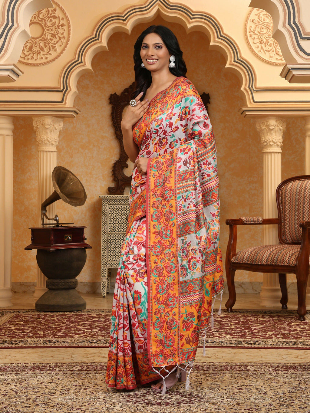 Multicolour woven linen cotton saree featuring intricate patterns with matching blouse fabric piece