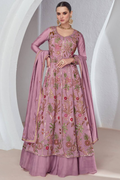 A pink viscose silk embroidered gown and skirt set with a lace-trimmed faux georgette dupatta.