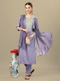 Woman wearing a lavender silk blend kurta set with intricate embroidery and sequence work, paired with trousers and dupatta.