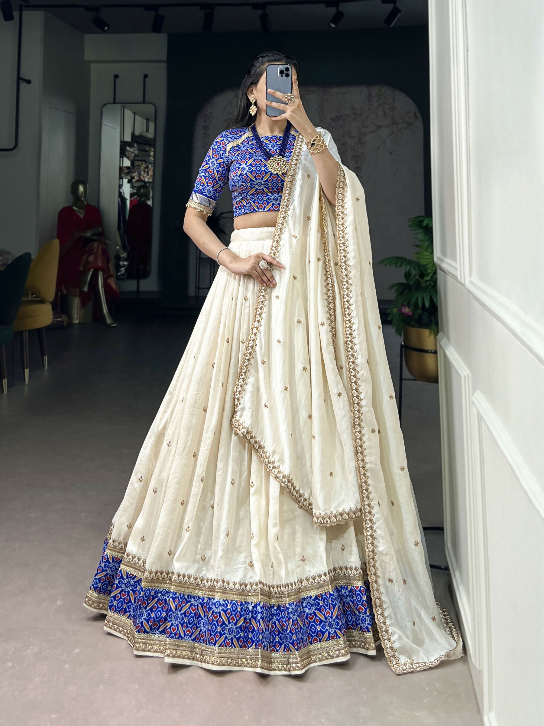 White Vichitra silk lehenga choli with sequins and thread embroidery detailing