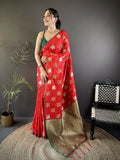 Red soft silk Banarasi saree adorned with elephant motifs paired with a green blouse