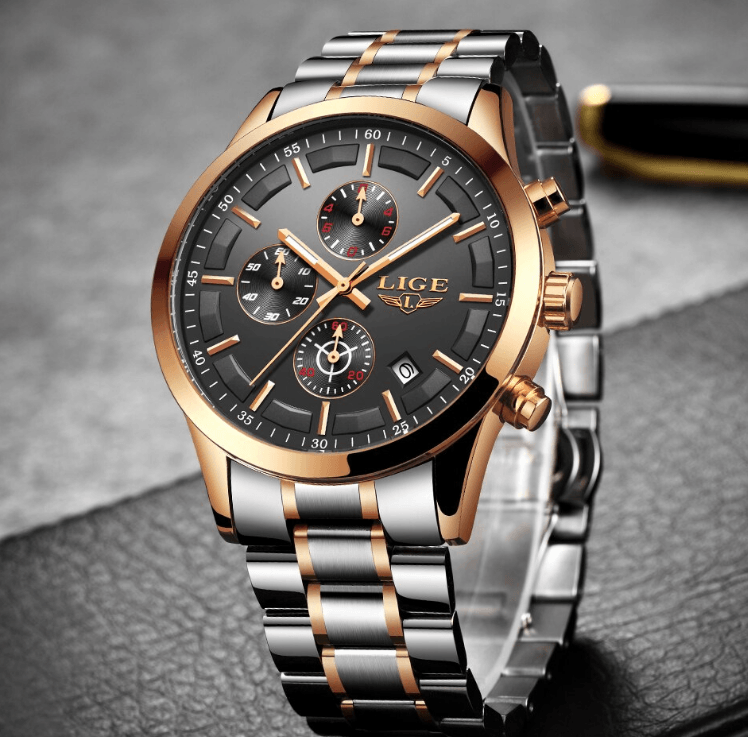 Close up of a luxury men's stainless steel chronograph watch with date display and ore crystal glass