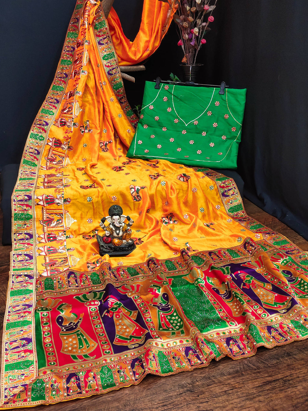 Yellow Vichitra Silk saree with embroidery and diamond work details and unstitched blouse fabric