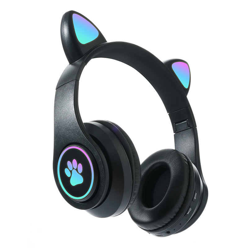Playful cat ear headphones for kids with LED lights in purple