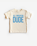 Model wearing an All American Dude graphic print crewneck t-shirt in a casual setting