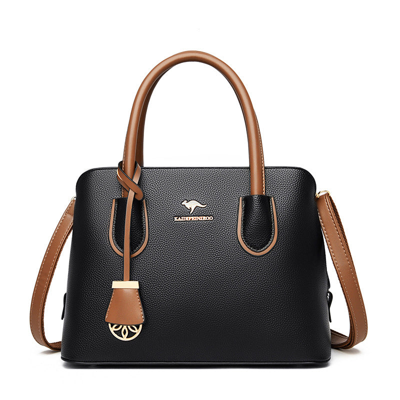 Spacious Leather Diaper Tote Bag with Crossbody Strap for Parents