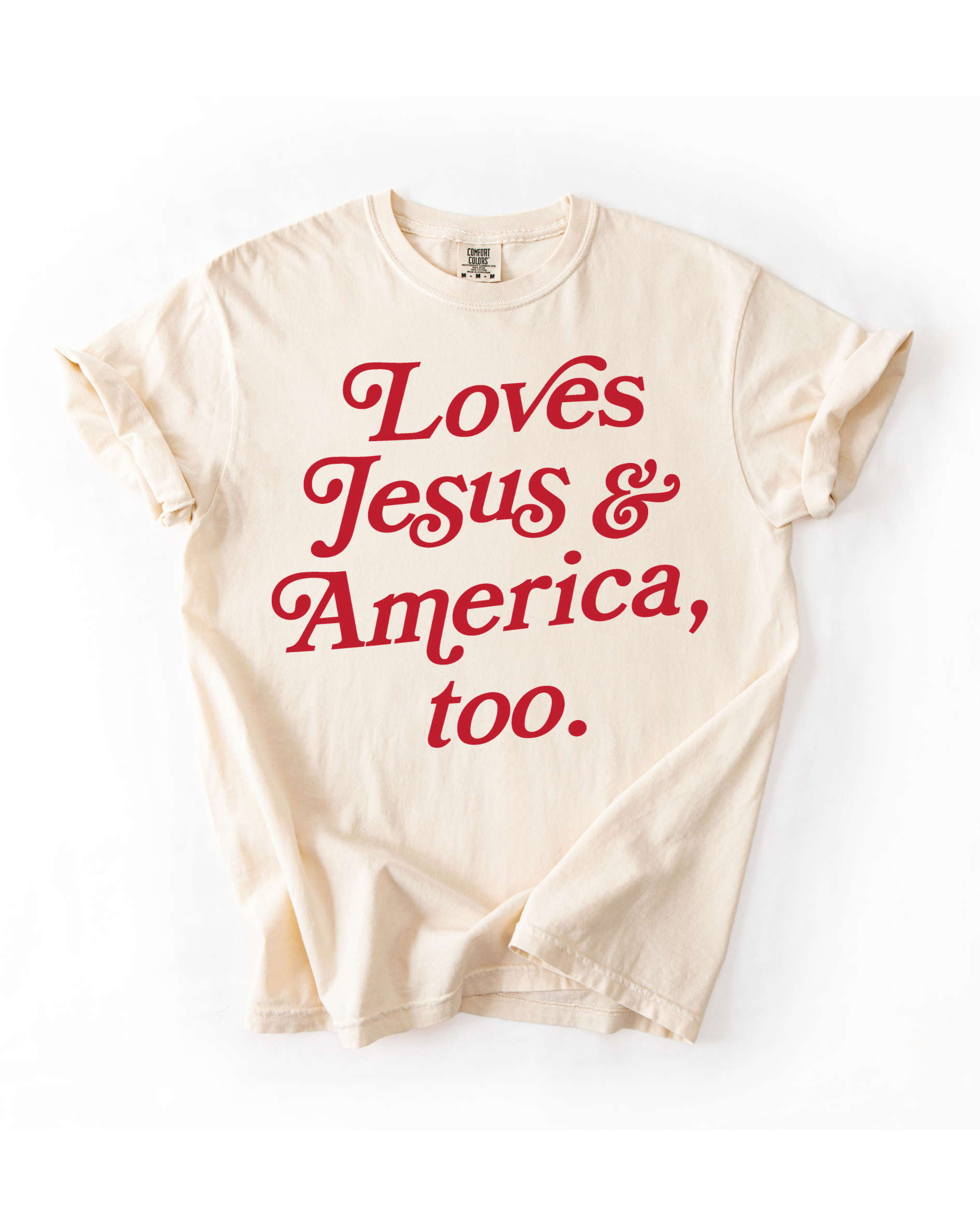 Loves Jesus + America, Too graphic tee in cream color, casual fit