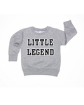 Kids wearing a solid knit varsity pullover in grey, black, and cream.