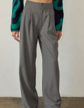 Model wearing Suki Straight-leg Pleated Trouser in Cool Grey with a professional straight-leg fit.