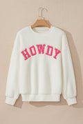 Front view of a white crew neck sherpa pullover featuring a pink and gold HOWDY letter patch on the chest, displayed on a wooden hanger against a neutral background.