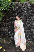 White pure silk saree with multicolour woven leaf design and zari pallu