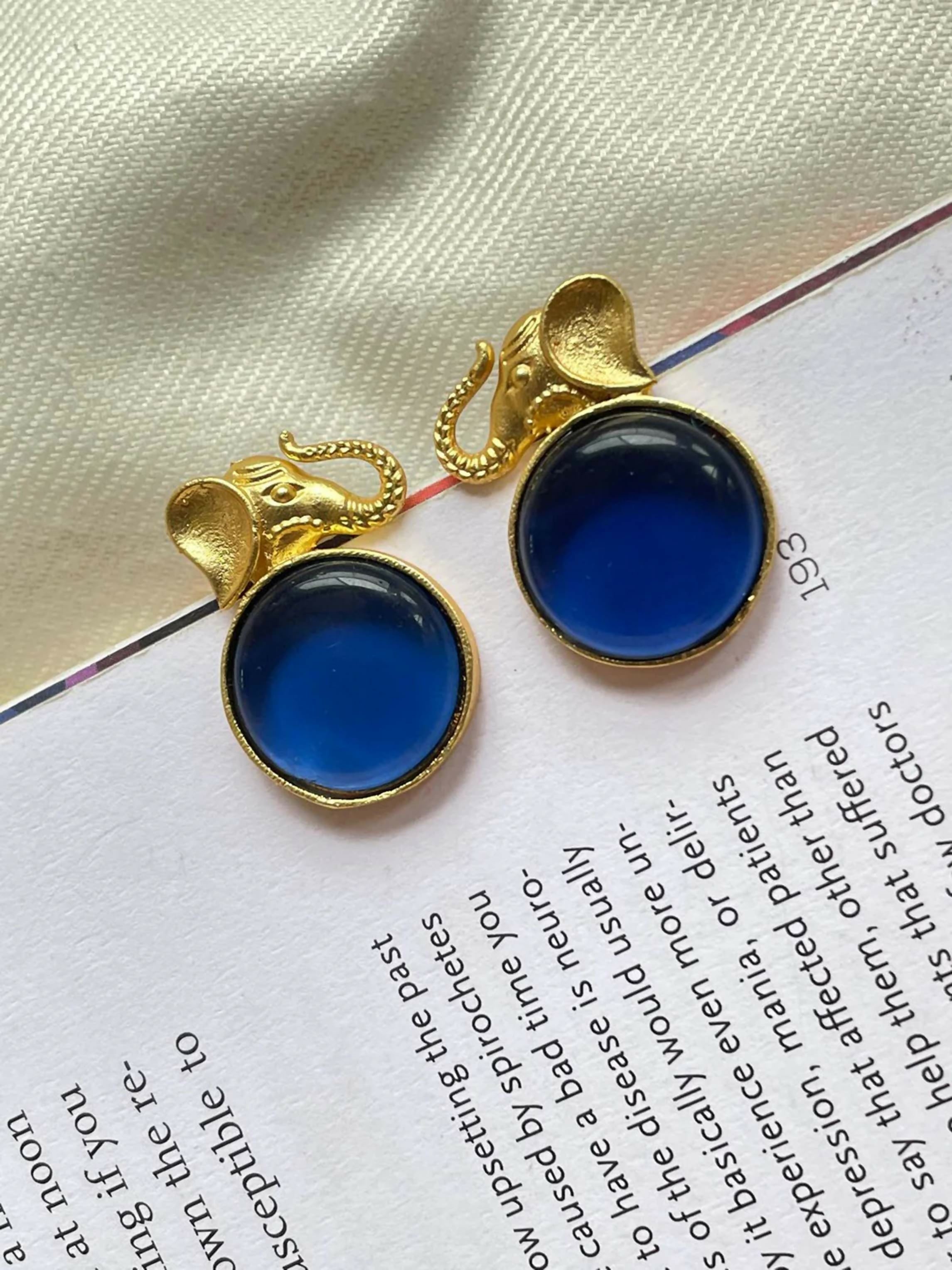 Blue Monalisa stone elephant shaped golden brass stud earrings