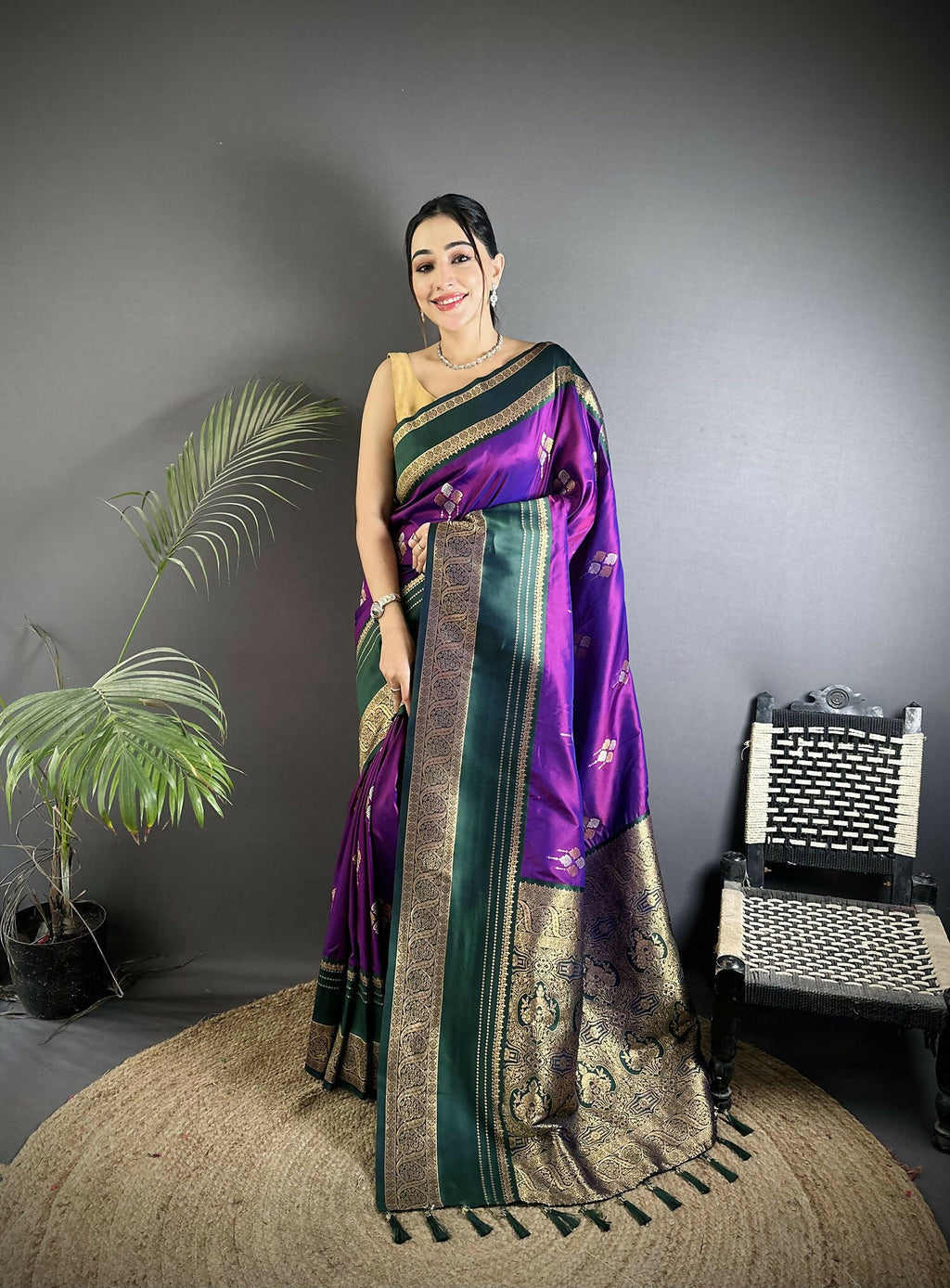 Elegant purple Banarasi soft silk saree with traditional woven patterns and matching blouse.