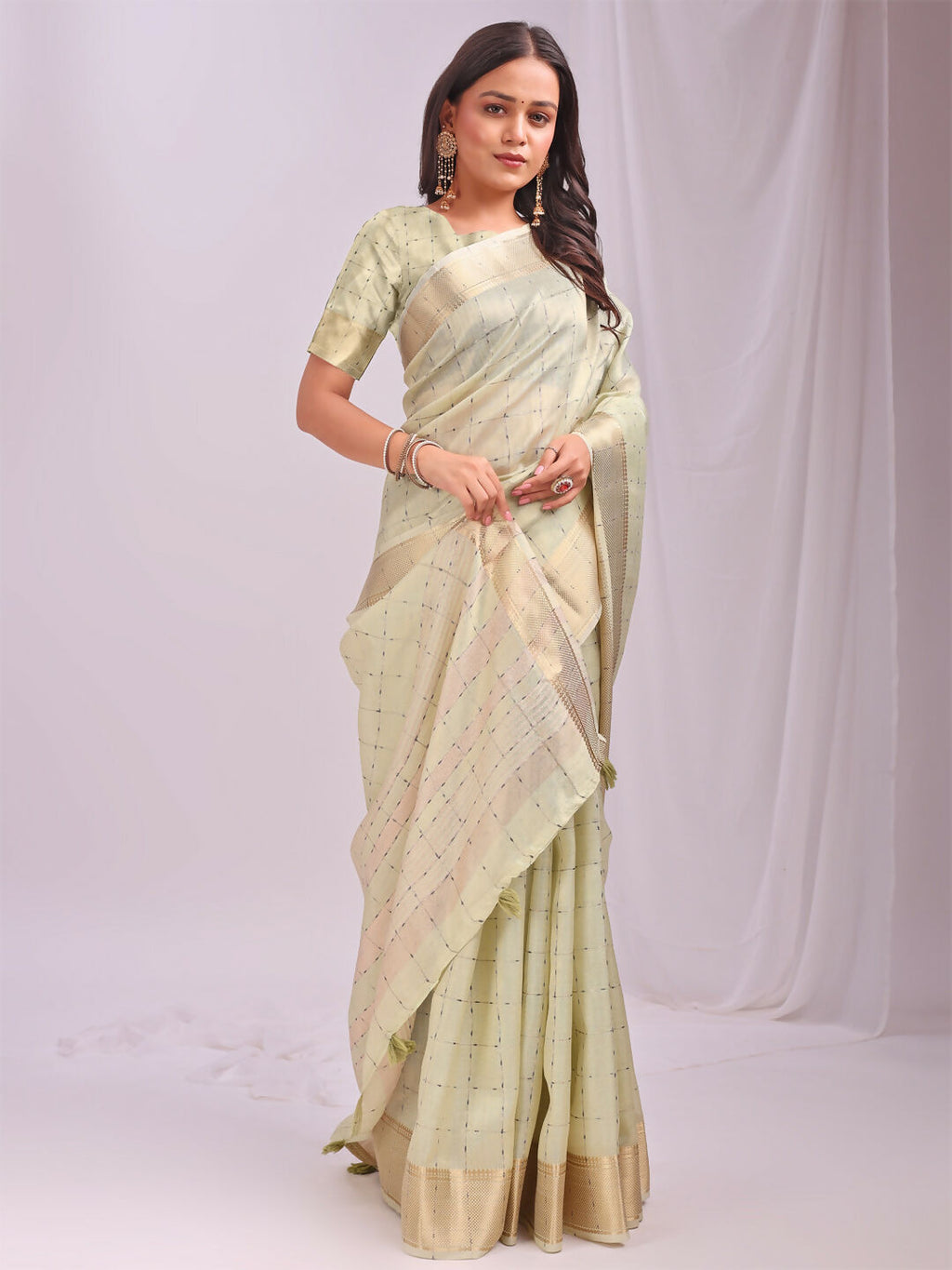 Light green organza saree with matching blouse fabric