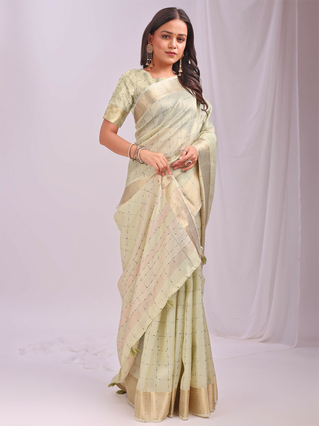 Light green organza saree with matching blouse fabric