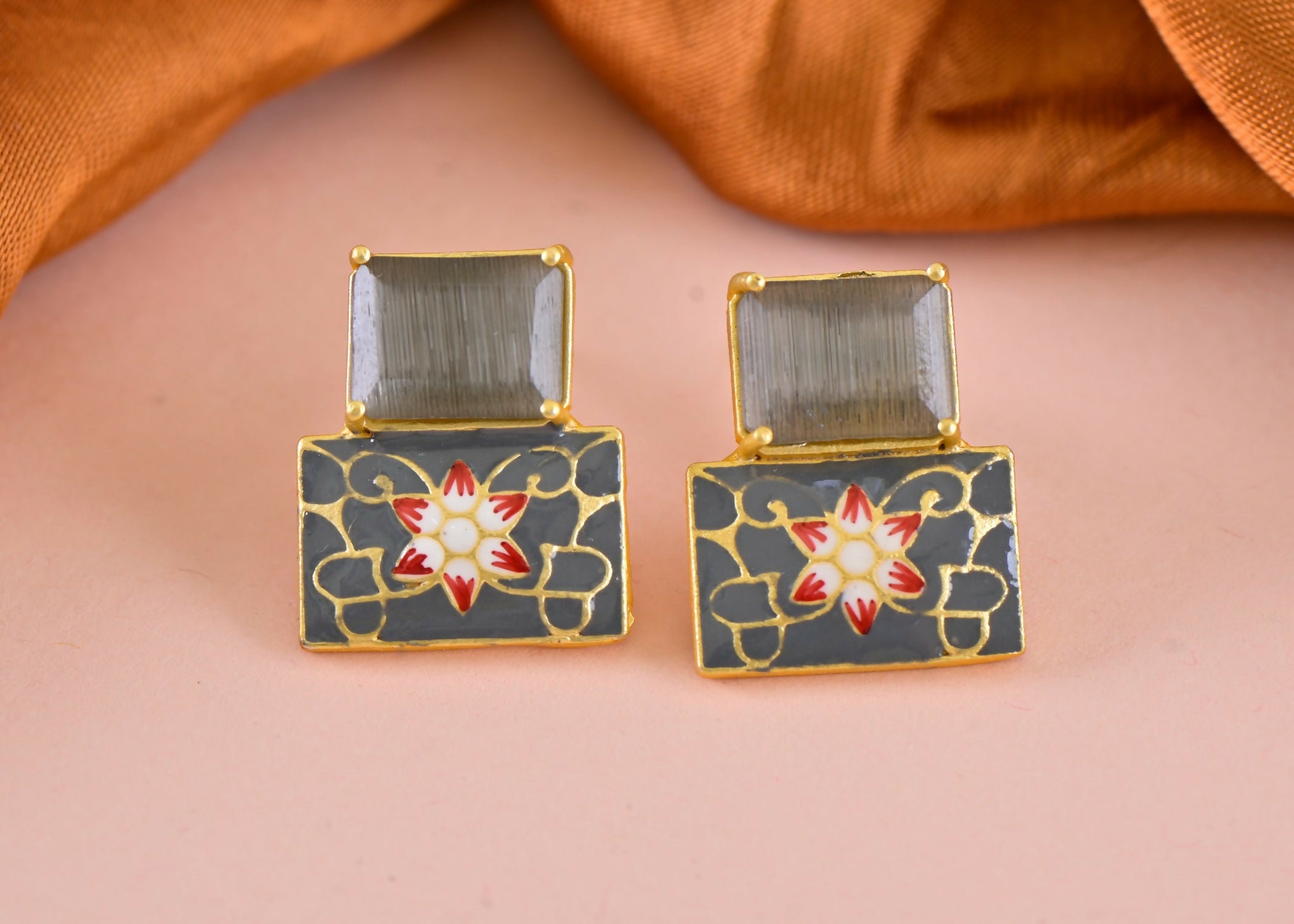 Elegant brass earrings featuring grey onyx stones, perfect for sophisticated styling.