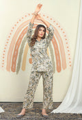 An off-white designer co-ord set with chic printed patterns on high-quality rayon