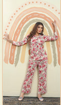 A stylish pink printed rayon co-ord set featuring a matching top and bottom for women.