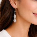1.5-inch dangle earrings featuring natural grey Embira seeds