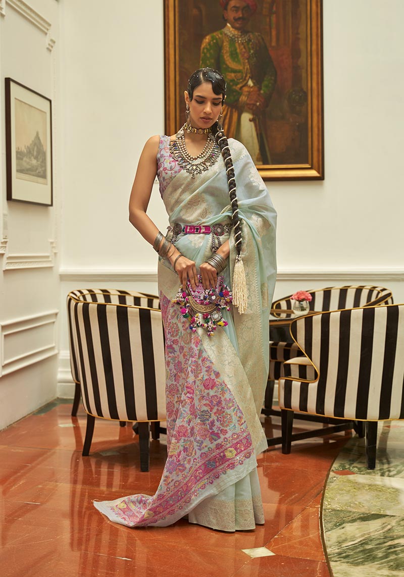 Sky blue handloom silk saree with woven details and matching blouse