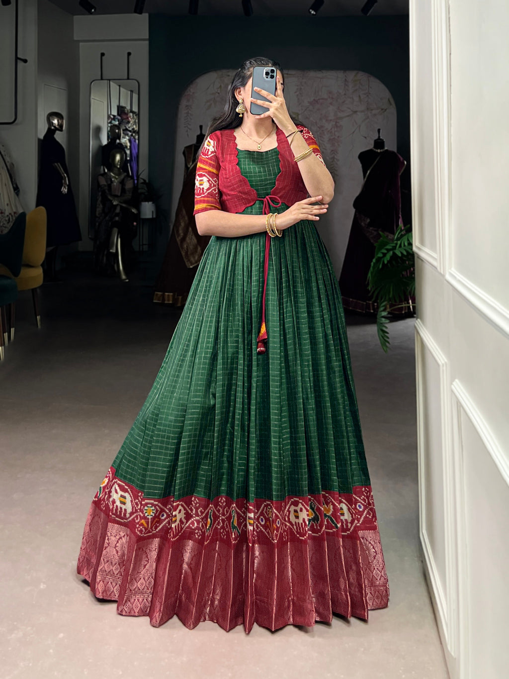 Green and maroon Tussar Chex gown with Patola print and weaving work border