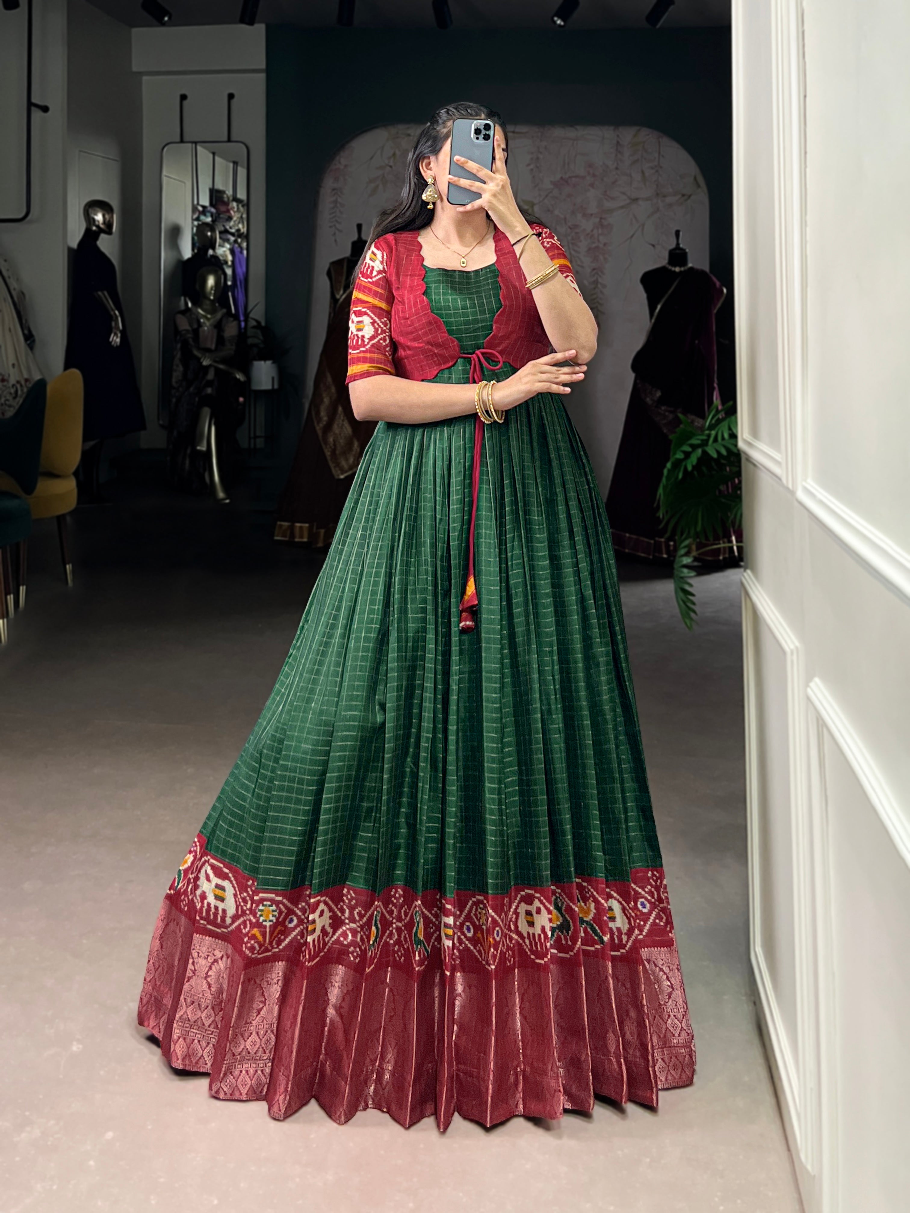 Green and maroon Tussar Chex gown with Patola print and weaving work border
