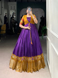 Purple Tussar Chex gown with Patola print and weaving work border