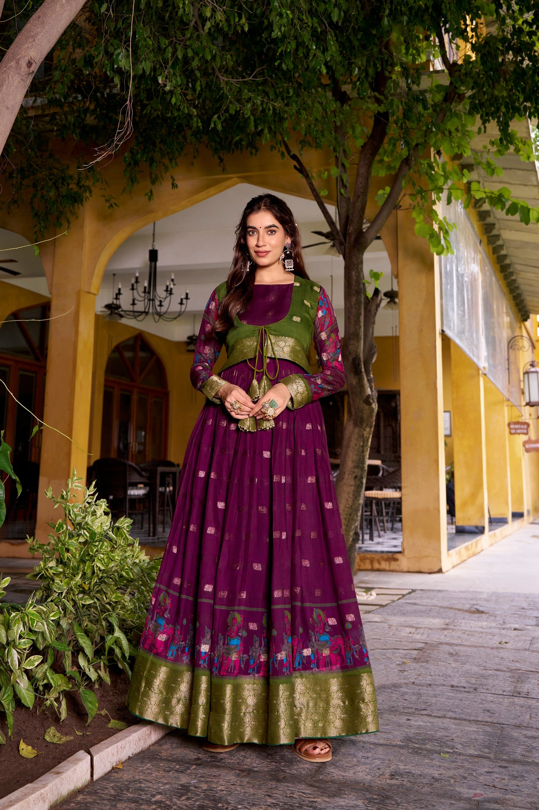 Wine poly-cotton gown with Kalamkari print and zari weaving border including a matching koti