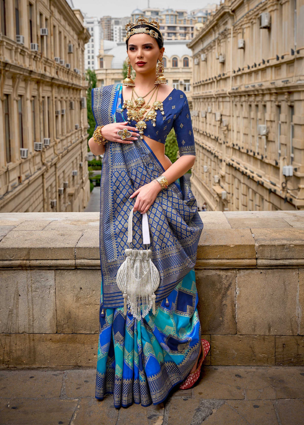 Navy Blue silk saree featuring a detailed geometric woven border and blouse