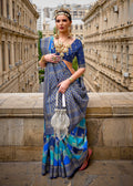 Navy Blue silk saree featuring a detailed geometric woven border and blouse