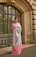 Elegant grey and pink silk traditional saree with intricate woven ethnic patterns