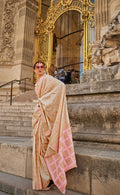 Beige woven silk traditional saree with elegant ethnic design