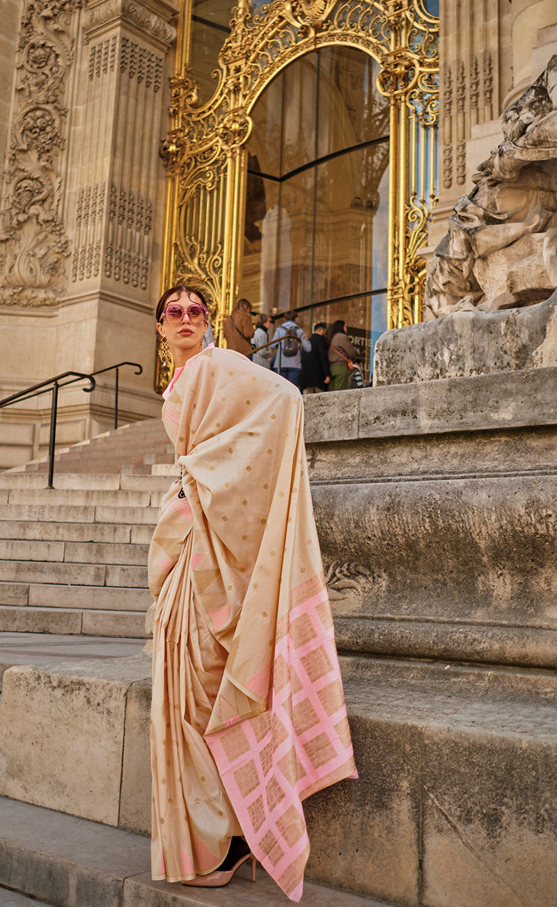 Beige woven silk traditional saree with elegant ethnic design