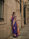 Slate blue silk woven festival saree with intricate traditional patterns