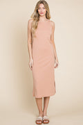 Close up of a sleeveless ribbed knit midi dress showing the textured fabric.