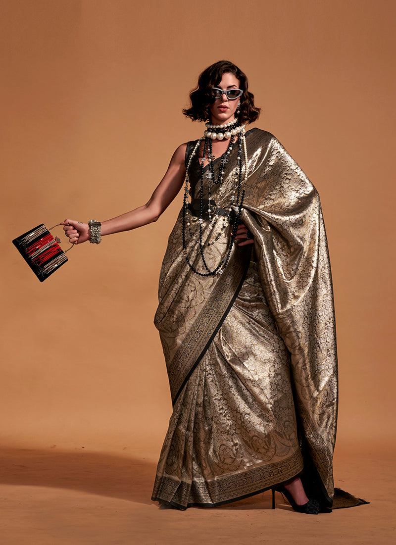 Black Kanjipuram silk saree with rich woven gold traditional patterns