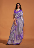 Dark violet Kanjipuram silk saree with metallic silver woven zari patterns and matching blouse