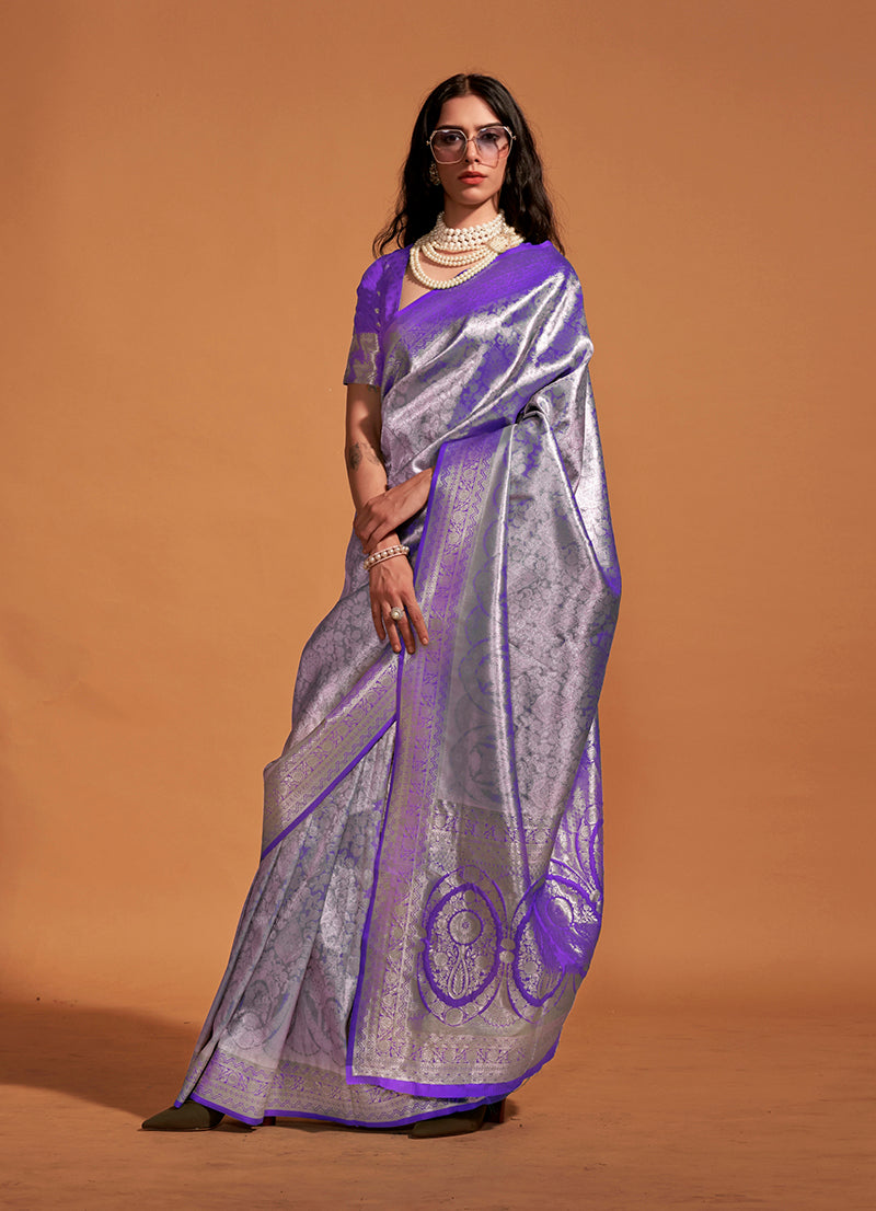 Dark violet Kanjipuram silk saree with metallic silver woven zari patterns and matching blouse