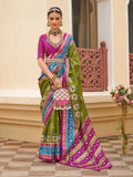 Multi-color sigma silk patola printed saree featuring mehendi green, magenta pink, and cyan blue