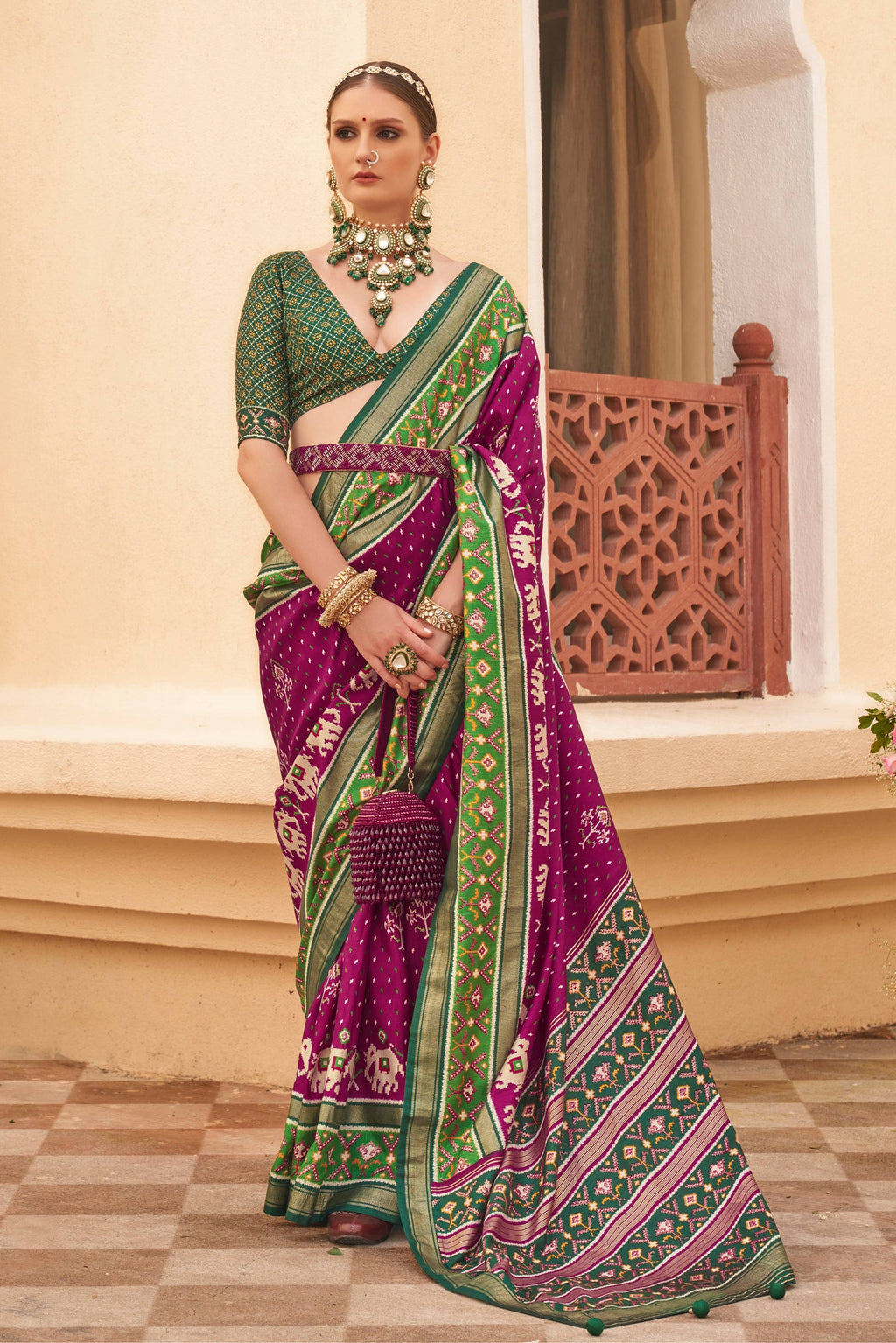 Dark purple Sigma silk saree with Patola print and matching blouse piece