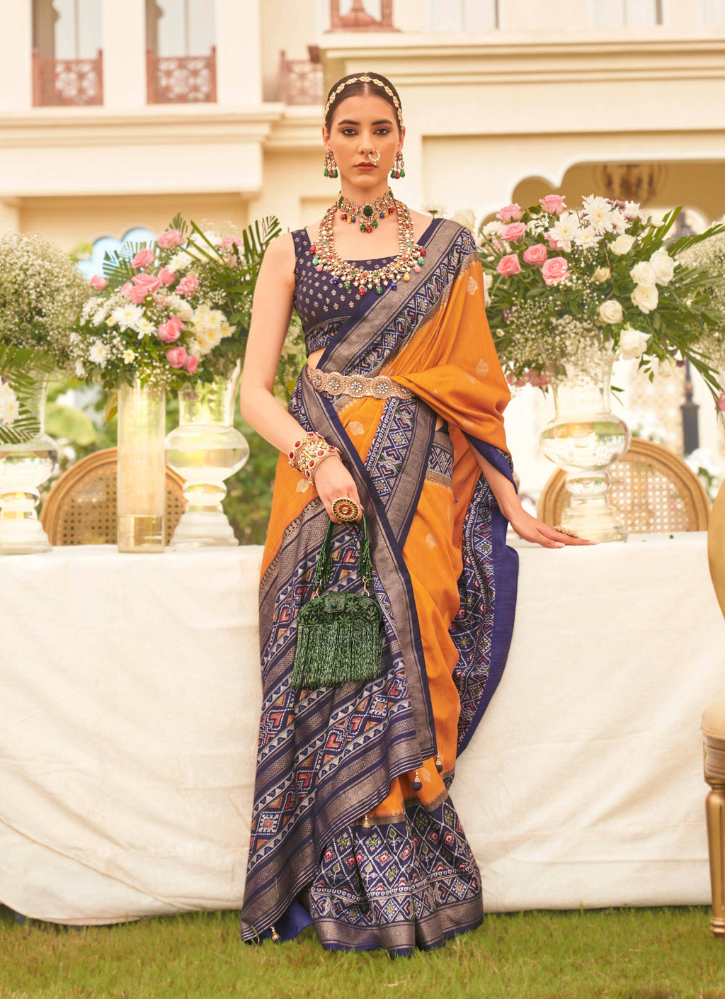 Mustard and navy blue Patola print silk saree
