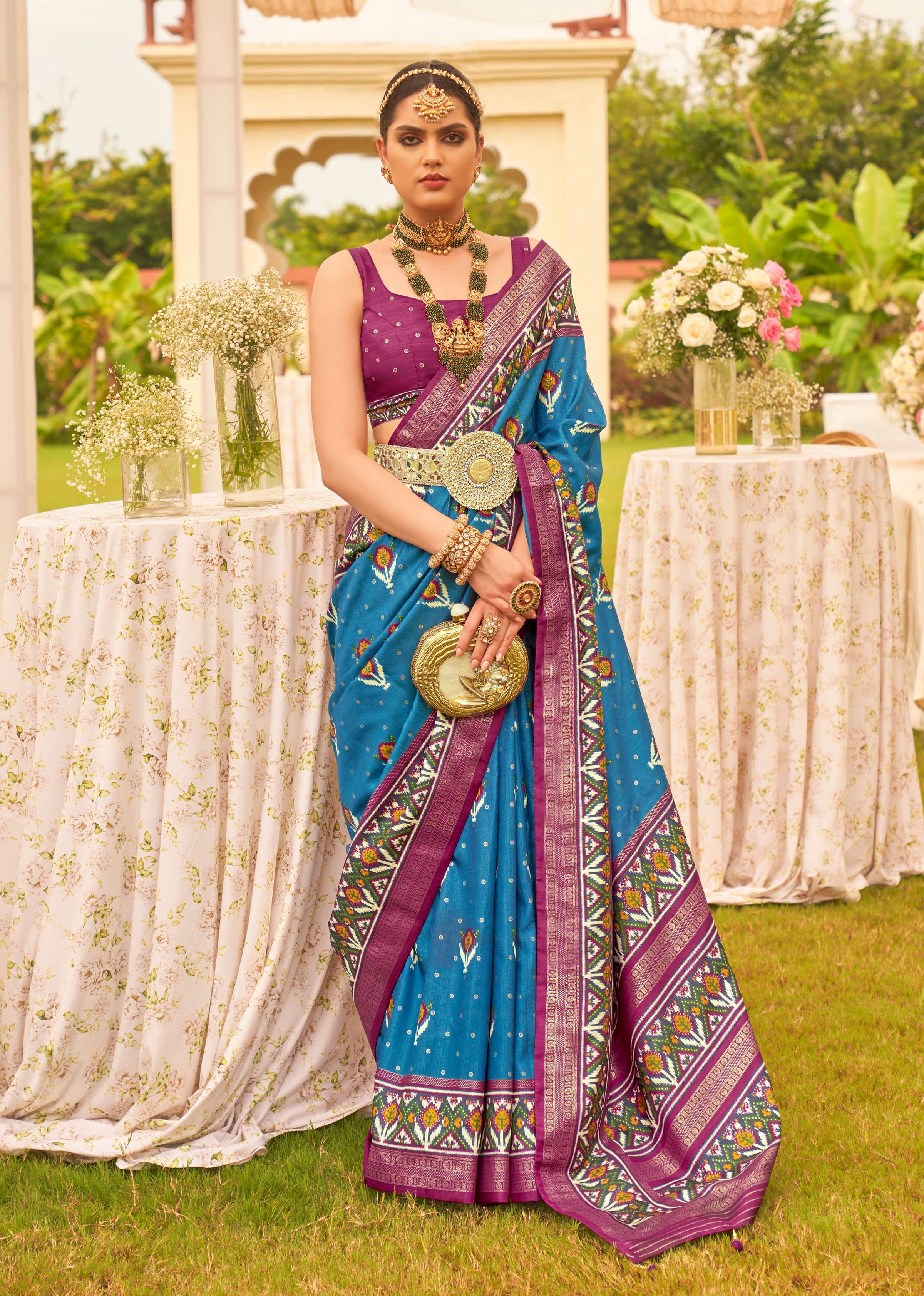 Blue Sigma Silk saree with intricate Patola geometric prints and matching blouse