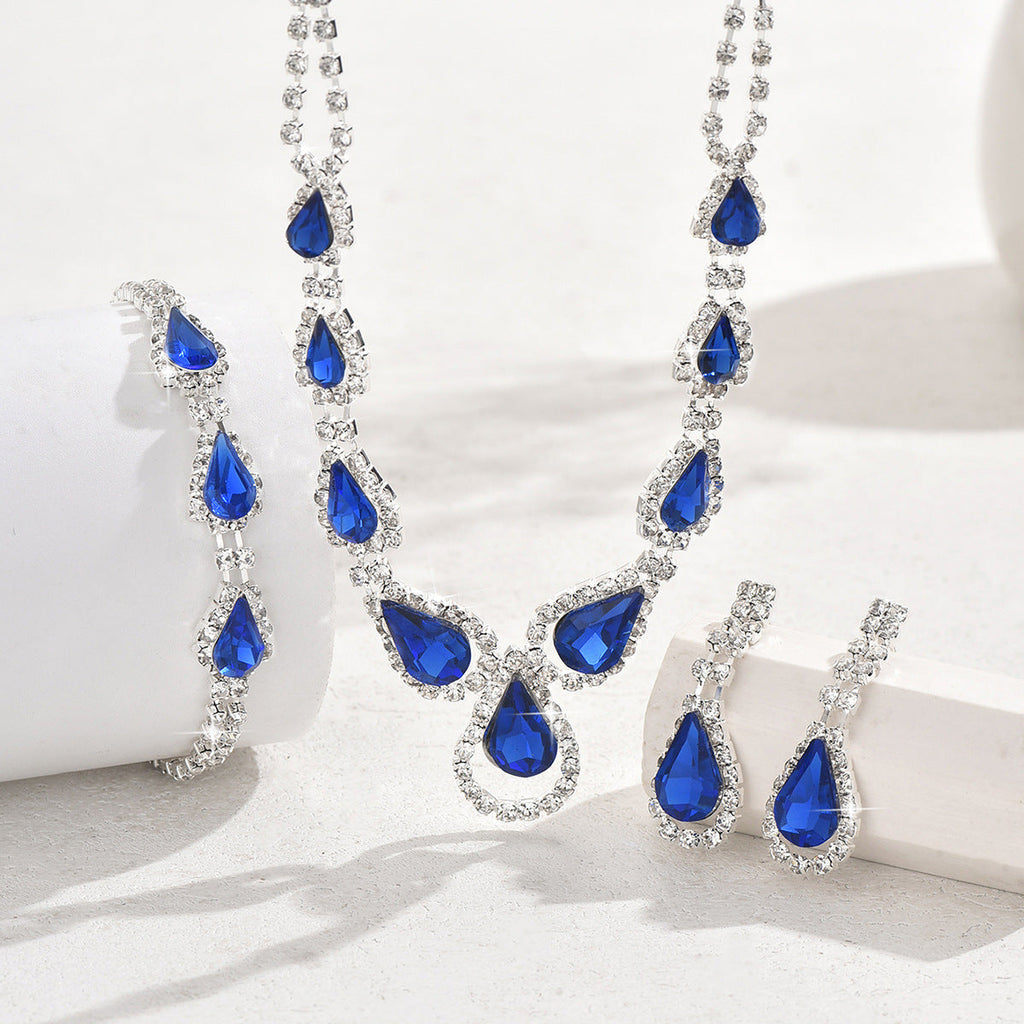 Women Simulated Sapphire Teardrop Halo 3Pcs Jewelry Set, V Neck Necklace Long Drop Earrings Thin Tennis Bracelet Gold Rhodium Two Tone Plated For Wedding Pageant September Birthstone Gift