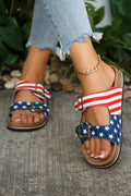 Maren hollowed faux suede slippers with dual buckle fastening in red, white, and blue.