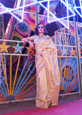 Beige handloom silk blend saree with ornate zari woven border